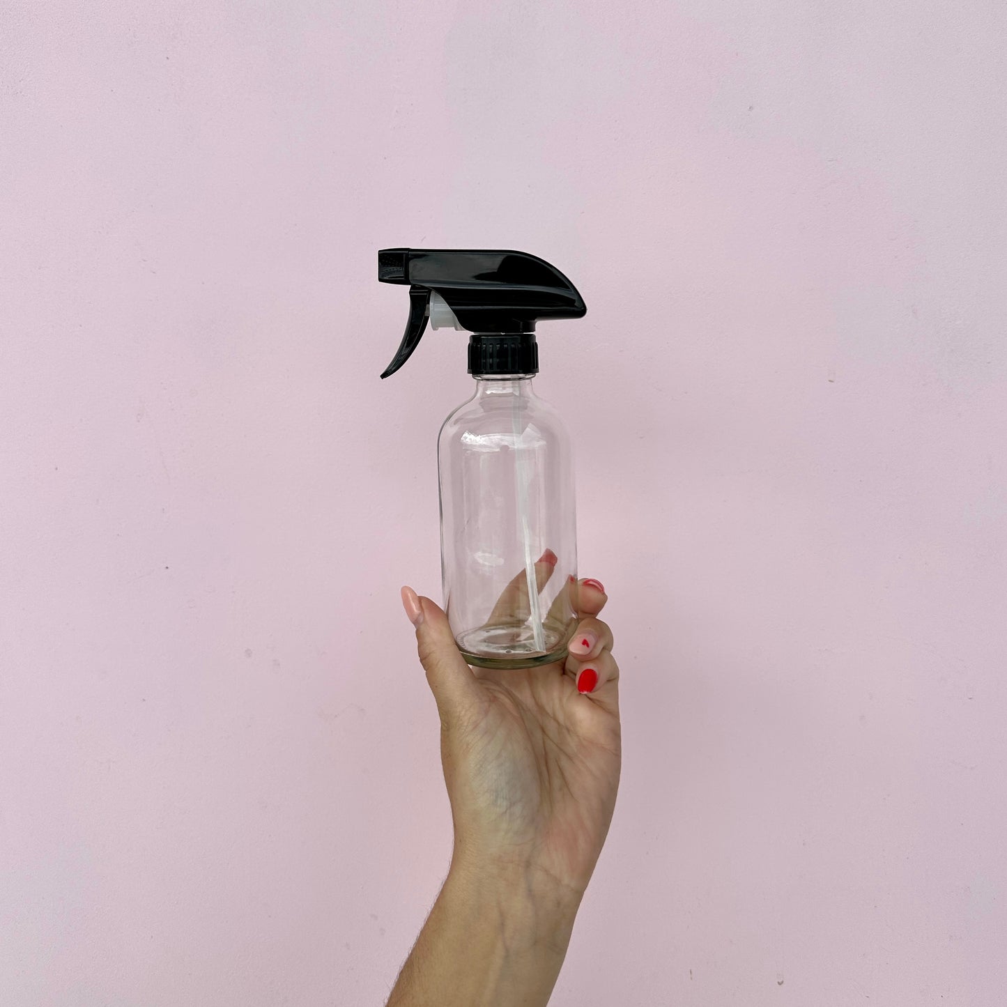 Clear glass spray bottle